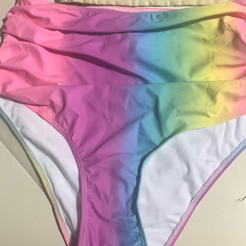 Bottoms of a swim suit. Size0XL multi colors.